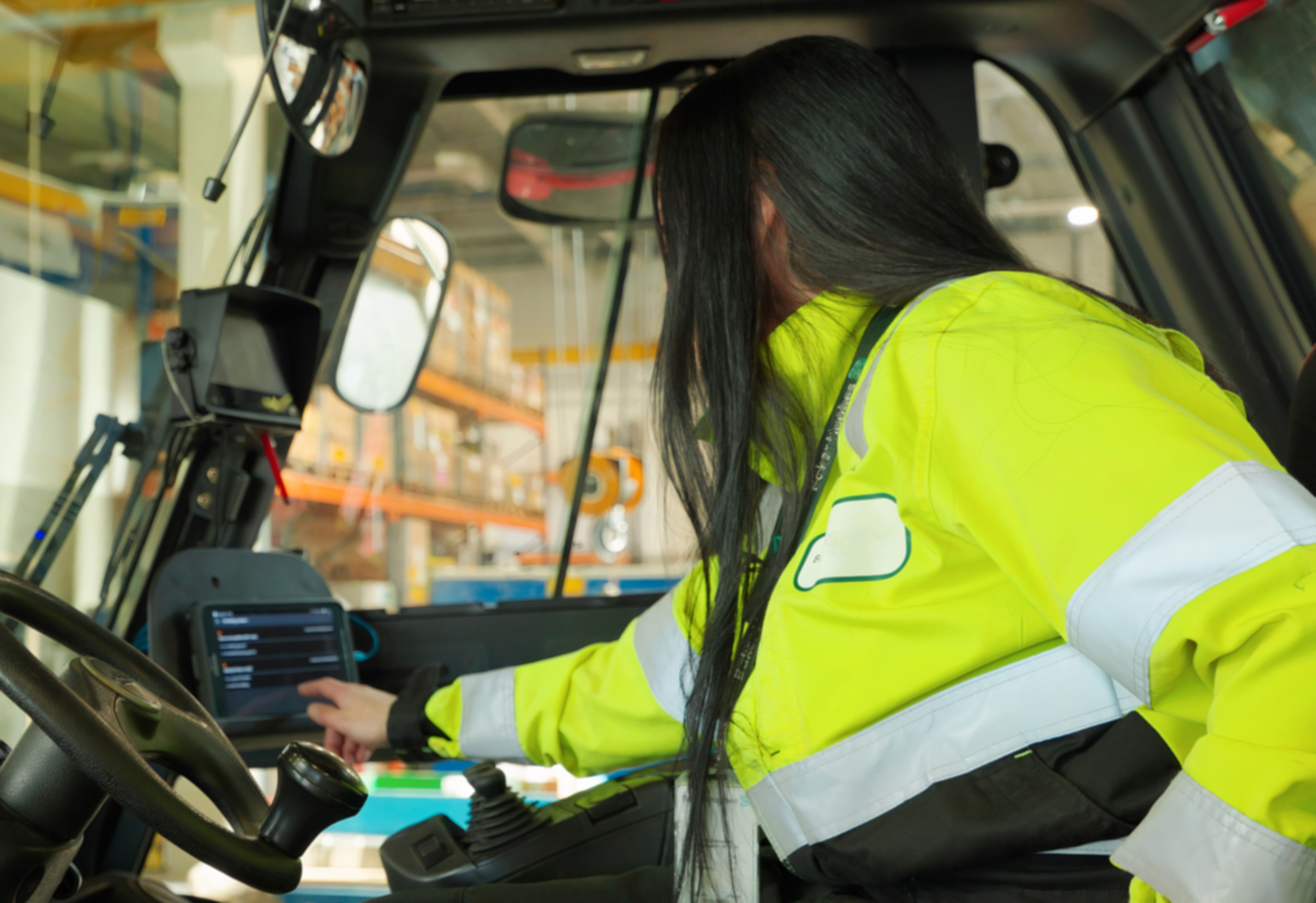 Operator moving equipment with a forklift at an oil and gas service base